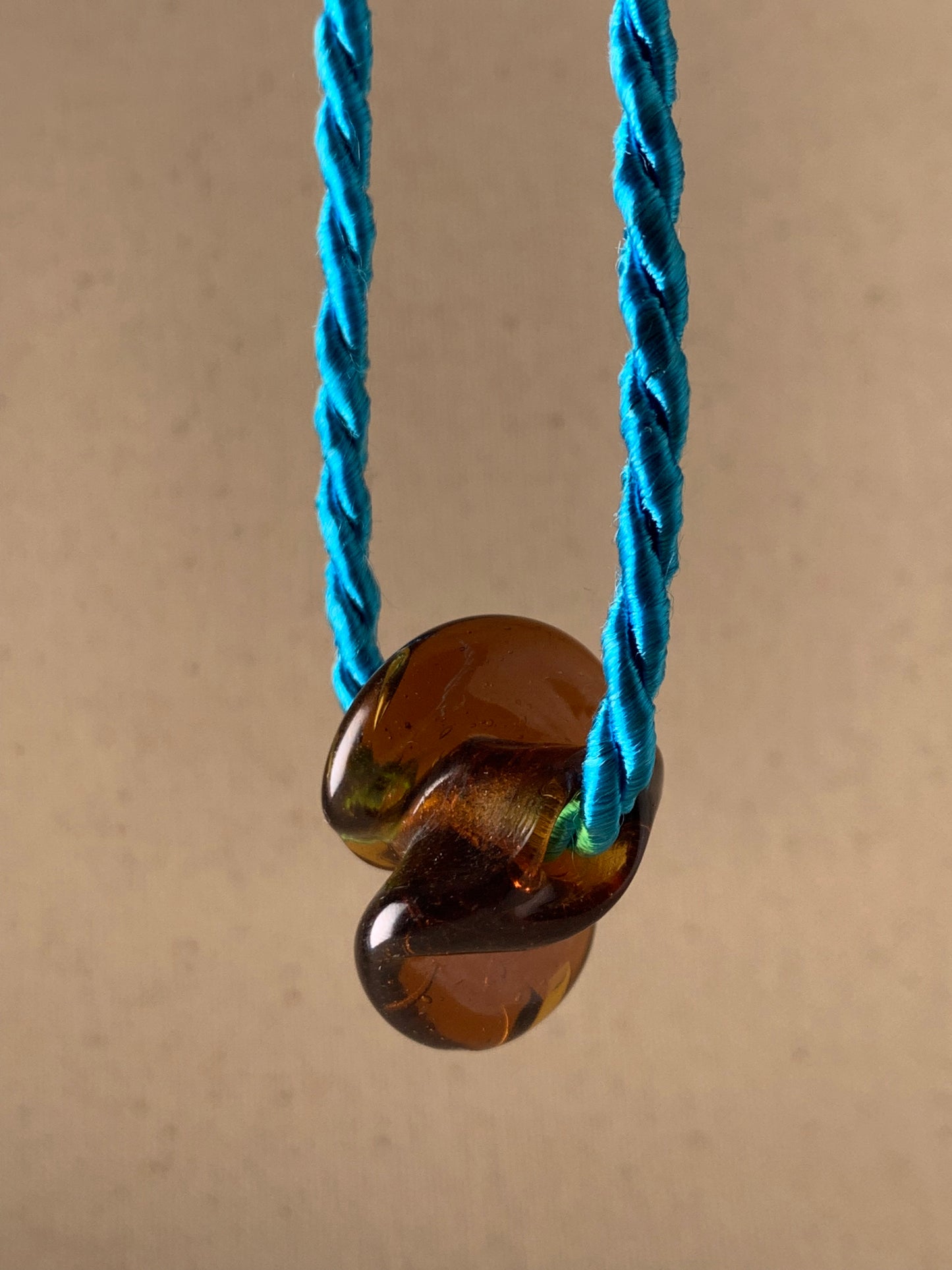 DEVOTEE TWIST NECKLACE, AMBER