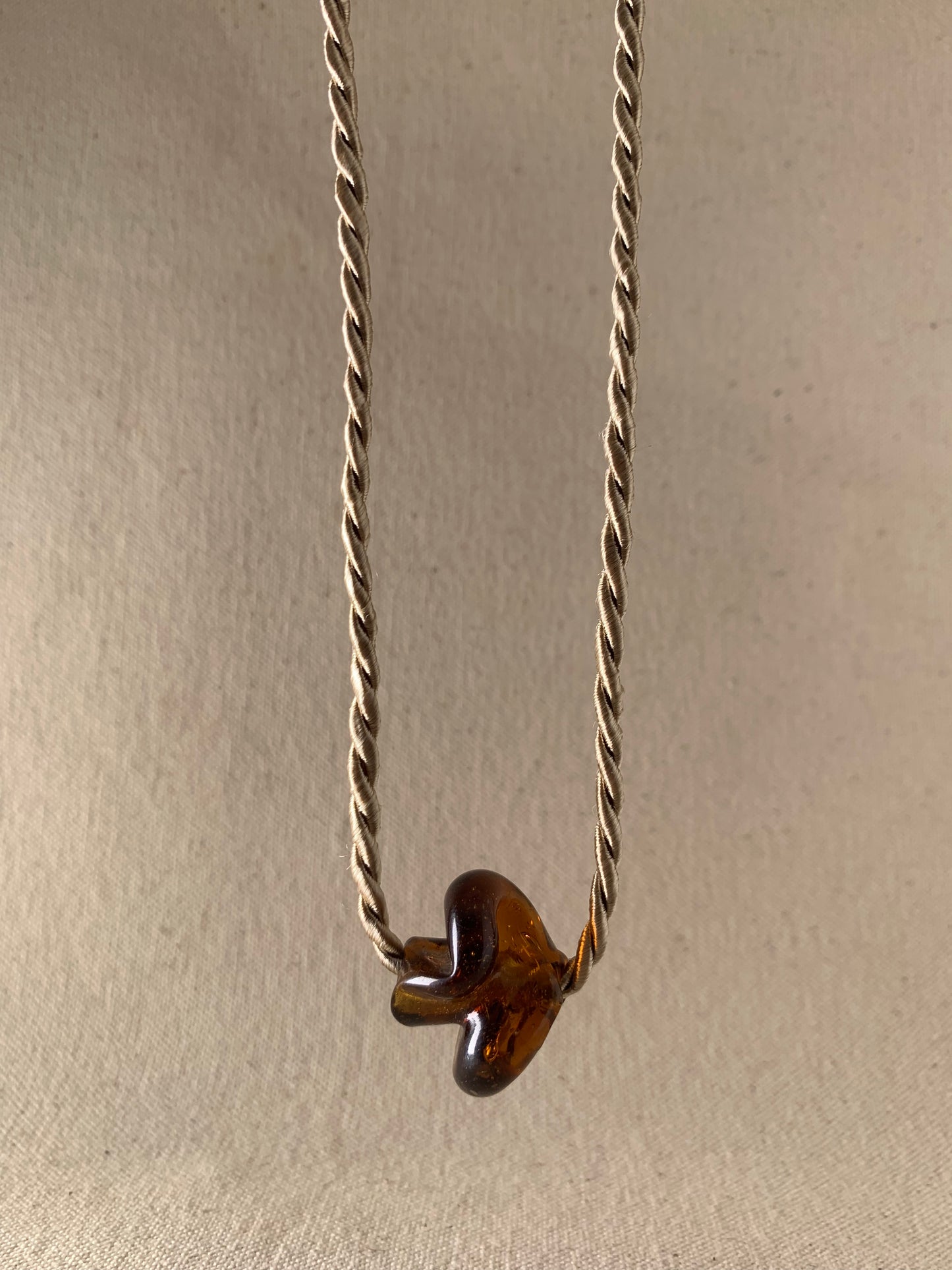 DEVOTEE TWIST NECKLACE, AMBER