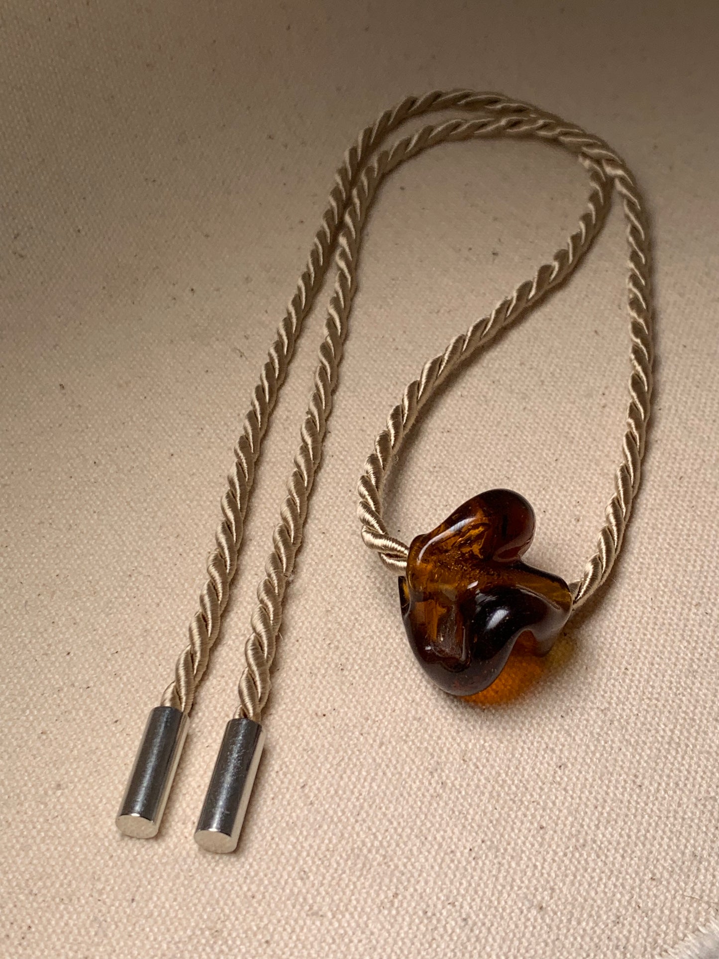 DEVOTEE TWIST NECKLACE, AMBER
