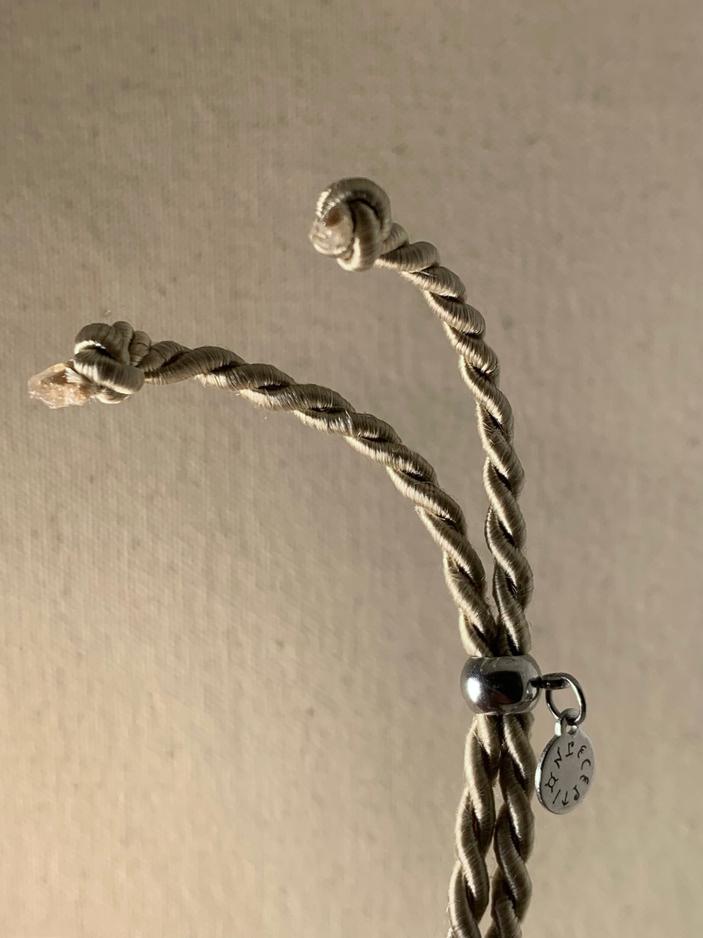 DEVOTEE TWIST NECKLACE, SMOKE